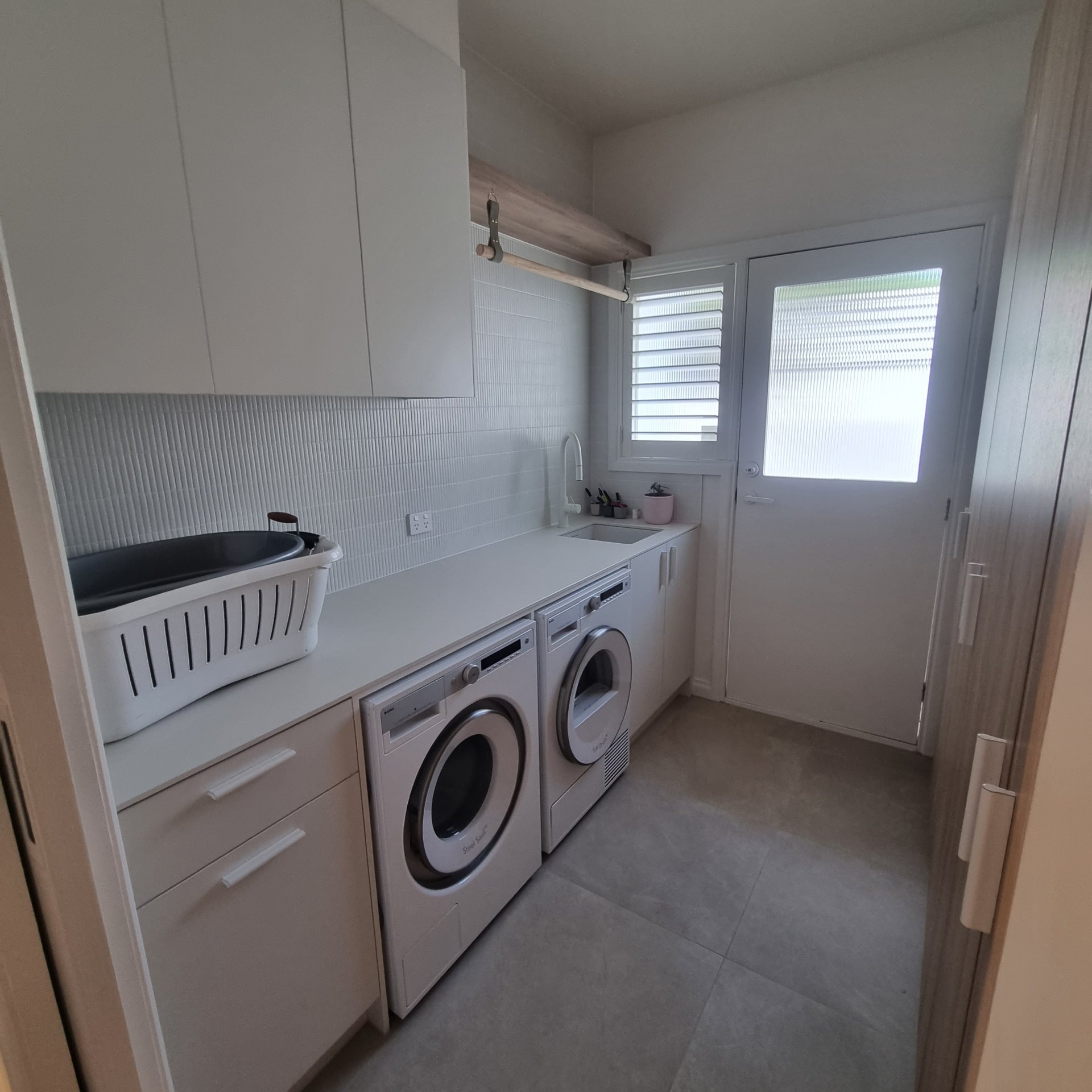 Fit Laundry Plumbing and Storage