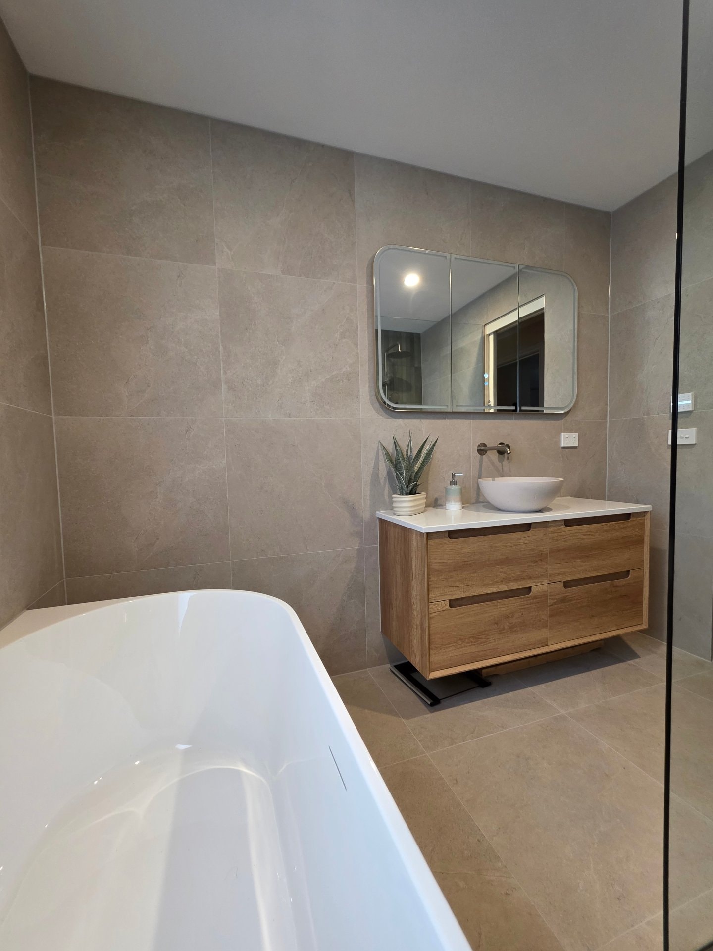 Fit Bathroom Fixtures and Finishes